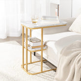 Sidebord med guldfarvet stel og bordplade i marmor-look