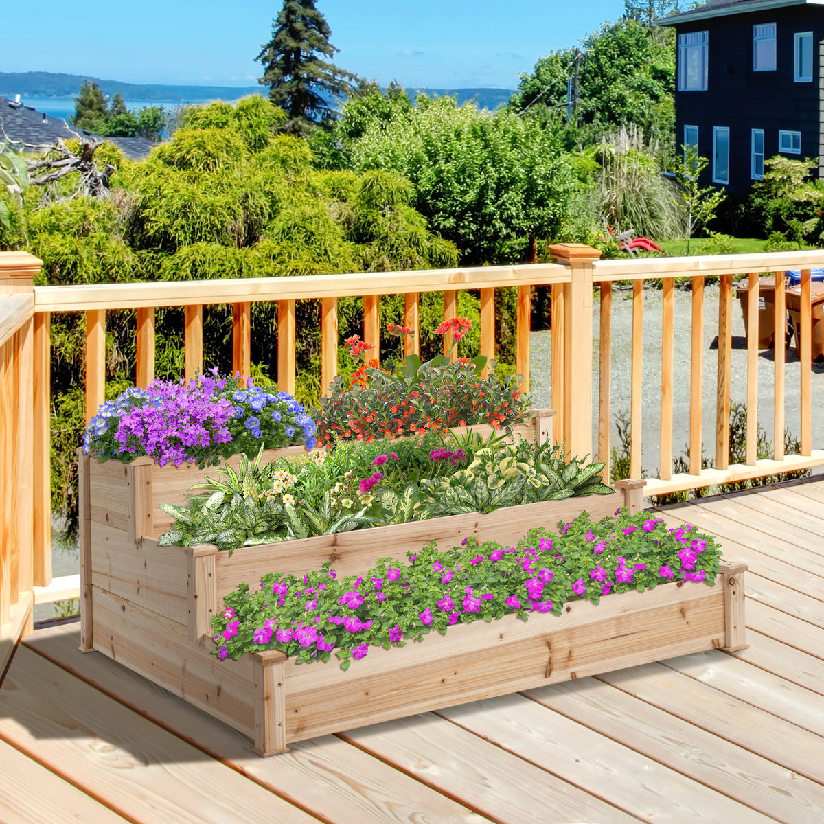 3-lags højbed i naturtræ på terrasse med farverige blomster og udsigt