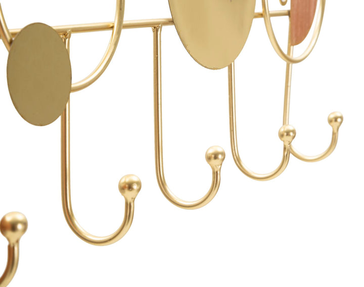 WEDNESDAY WALL HANGER – Vægophæng i guld med rosa detaljer (47 x 4,8 x 21,7 cm)