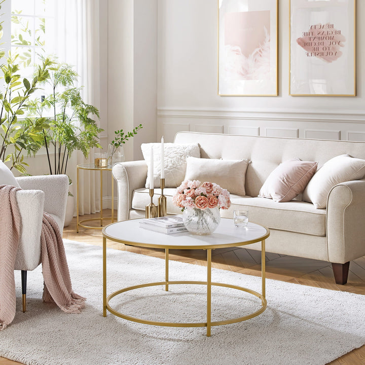 Elegant rundt sofabord – moderne design i guld og hvid