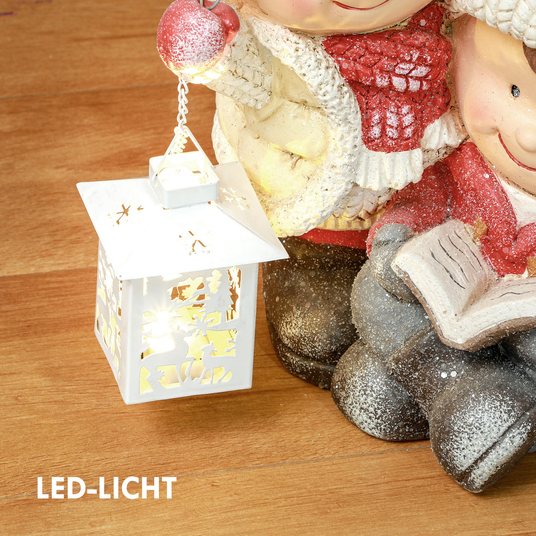 Julenisse med bog og lanterne, led, batteridrevet, 30 x 23 x 45 cm