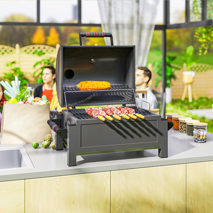 Kulgrill med låg, varmehylde, askeskuffe, termometer, rustfrit stål, 67 x 53 x 55 cm, sort/rød