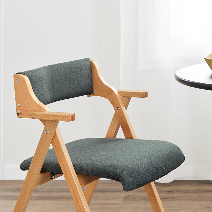 Sammenklappelig træstol med hynde – pladsbesparende og komfortabel spise- og loungestol i mørkegrå