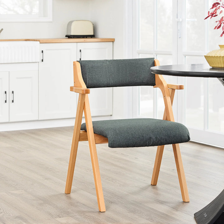 Sammenklappelig træstol med hynde – pladsbesparende og komfortabel spise- og loungestol i mørkegrå