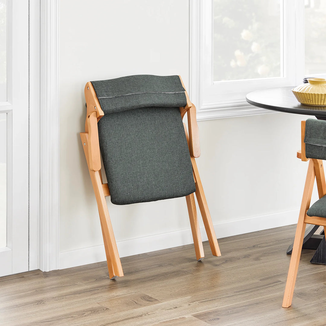 Sammenklappelig træstol med hynde – pladsbesparende og komfortabel spise- og loungestol i mørkegrå