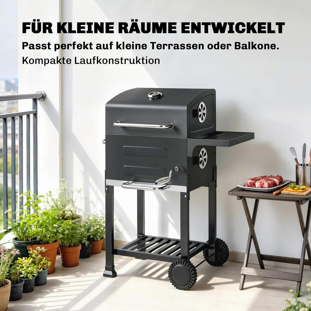 Kompakt kulgrillvogn med låg, termometer, grillrist, sidebord, askeskuffe og ventilationsåbninger.