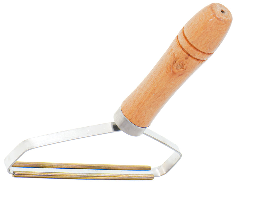 Tøjbarbermaskine til at fjerne hårkrummer