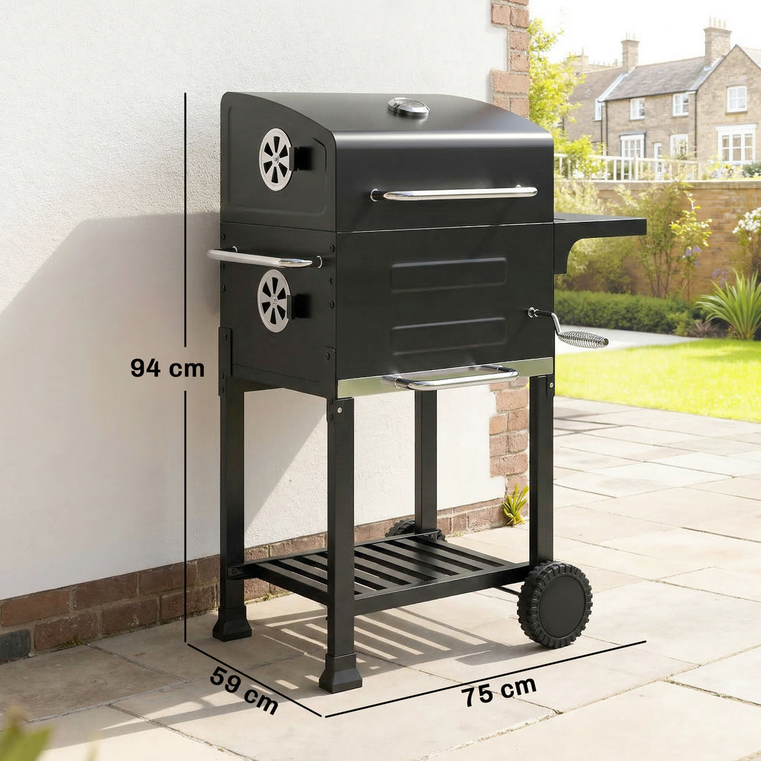 Kompakt kulgrillvogn med låg, termometer, grillrist, sidebord, askeskuffe og ventilationsåbninger.