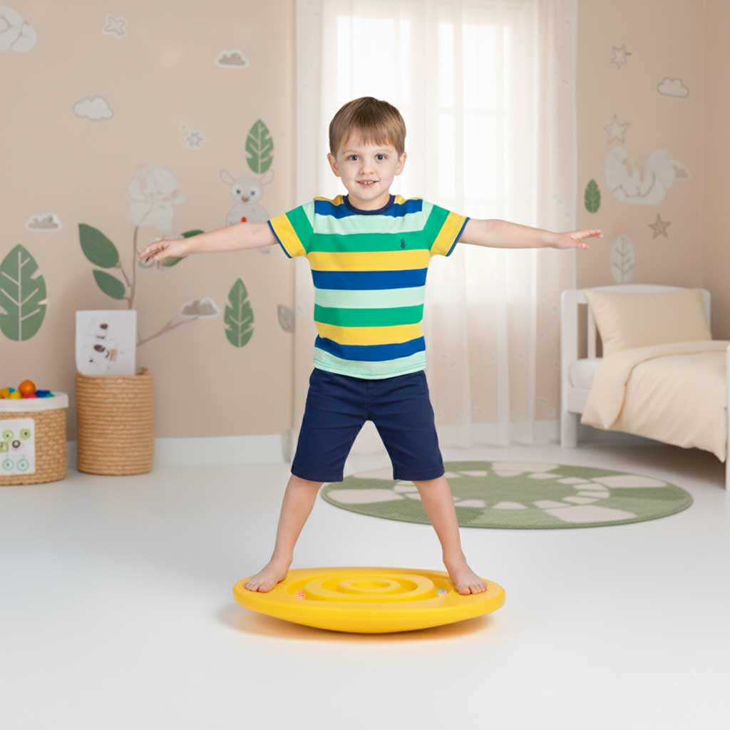 Balancerende balancebom med orange kugler