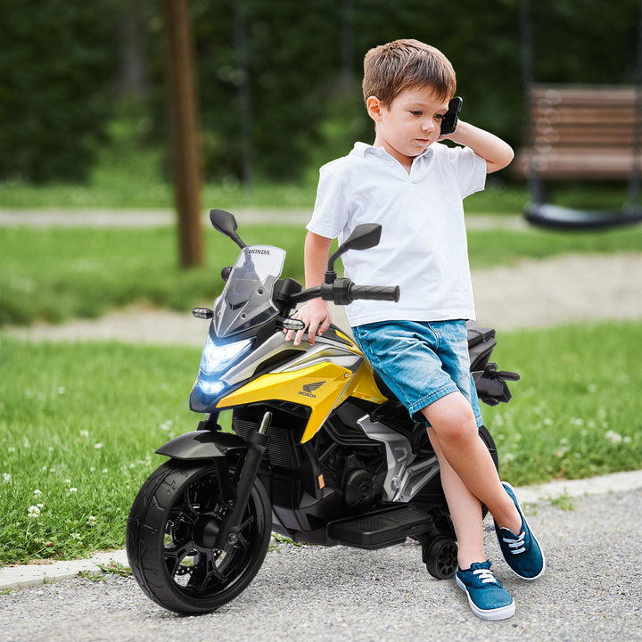 Elektrisk børnemotorcykel, Honda, 3 km/t, musik og lys, 3-6 år, op til 30 kg, gul
