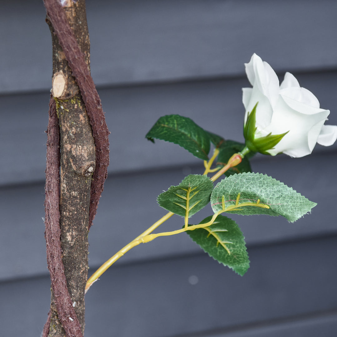Kunstigt træ i solen, kunstig plante i cementpotte, kunstig plante