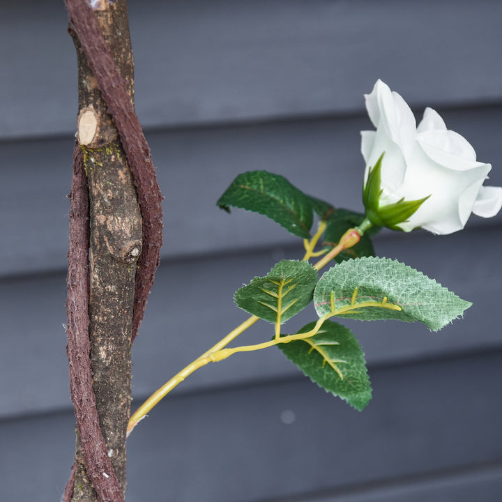 Kunstigt træ i solen, kunstig plante i cementpotte, kunstig plante