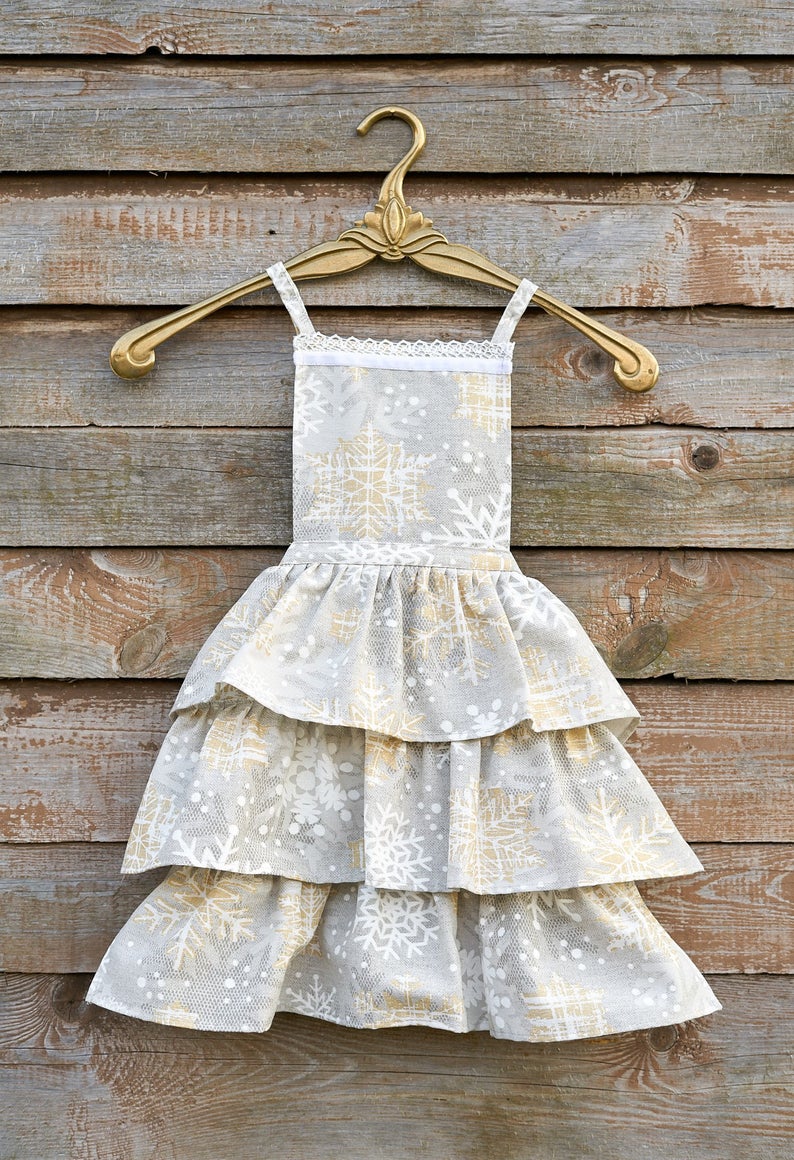 Vintermotiv børneforklæde med snefnug-print, bomuld-poly blanding | TeaLurex Oro