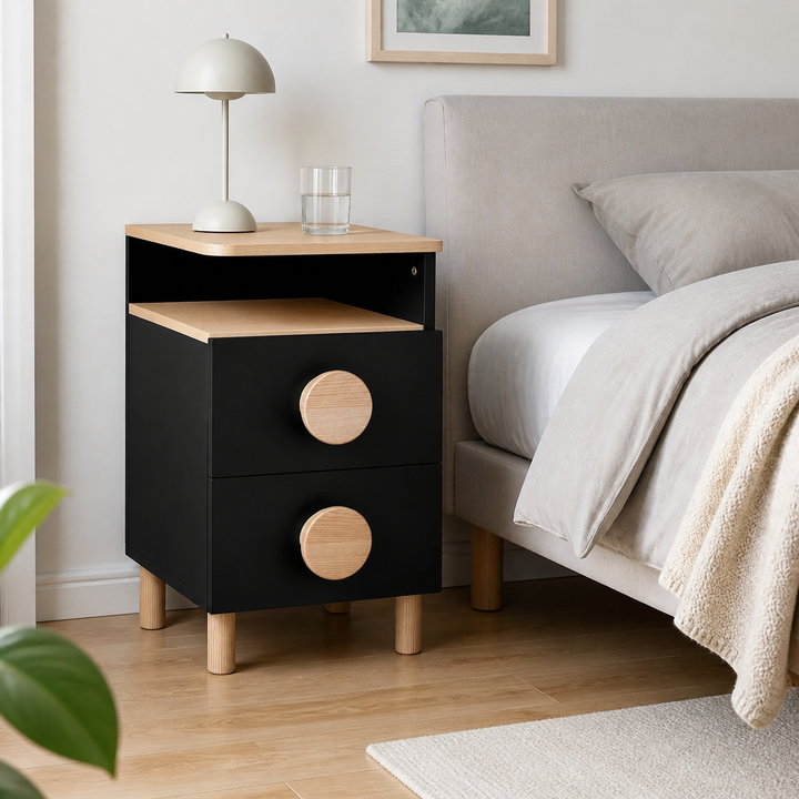 Sort DABI-sengebord set fra siden