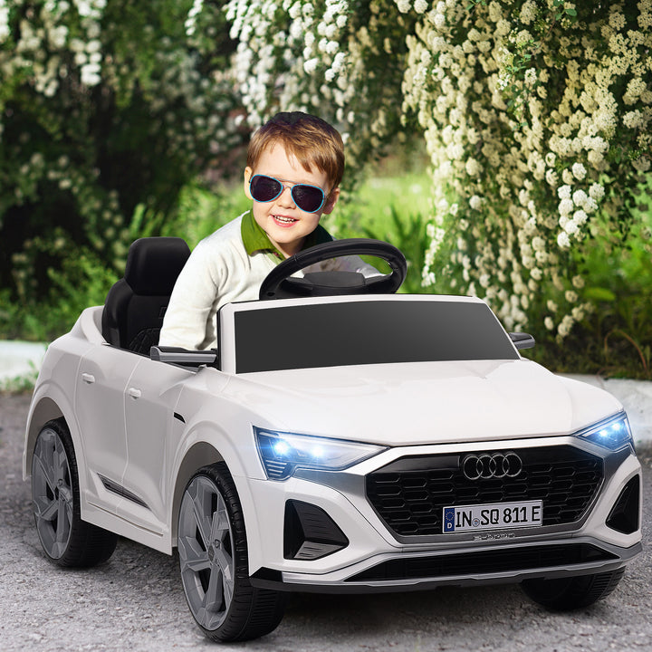 Elektrisk børnebil, 12v audi q8, 3-5 km/t, fjernbetjening, forlygter, musik, hvid
