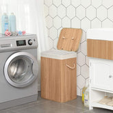 Placering i vaskerimiljøet ved siden af vaskemaskinen, vasketøjskurv med låg og aftagelig bomuldspose