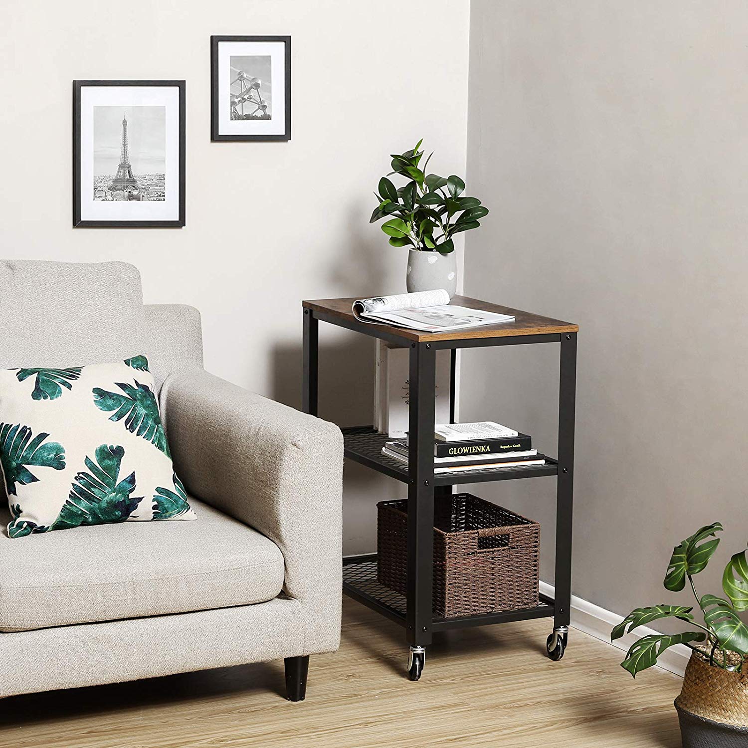 a living room filled with furniture and a potted plant 