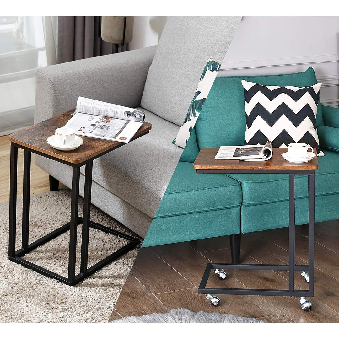 a wooden table with a laptop on it 