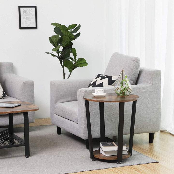 a living room filled with furniture and a potted plant 