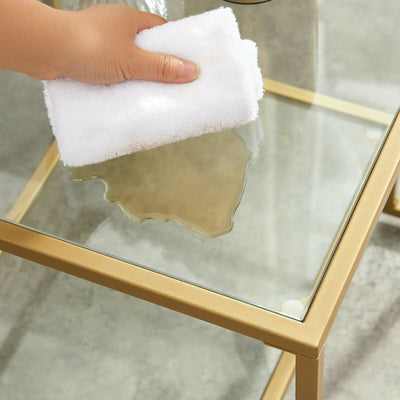 Konsolbord i glas med guldfarvet ramme, art deco-look